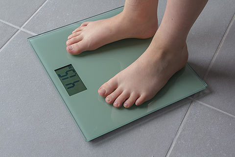 Too much weight harms kids feet.